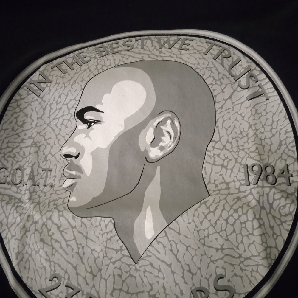 Michael Jordan Men's SMALL G.O.A.T. 1984 $23.00 Coin T-shirt (Black)